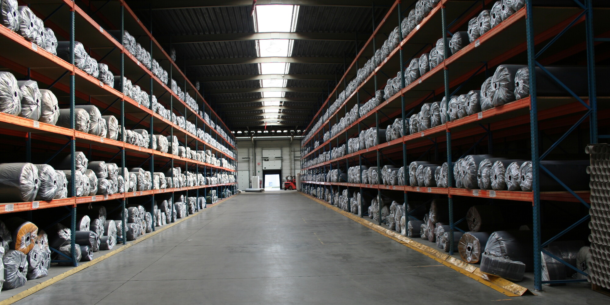 Artificial grass for warehouses and storage areas