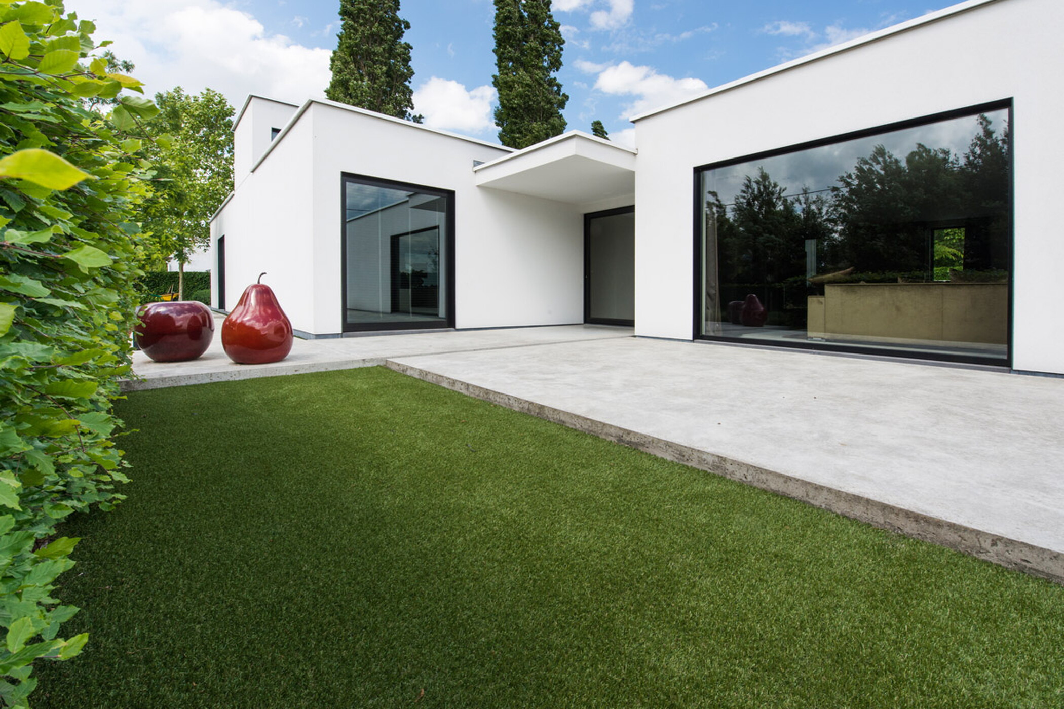 Durable artificial grass for a modern garden, comfortable and easy to maintain