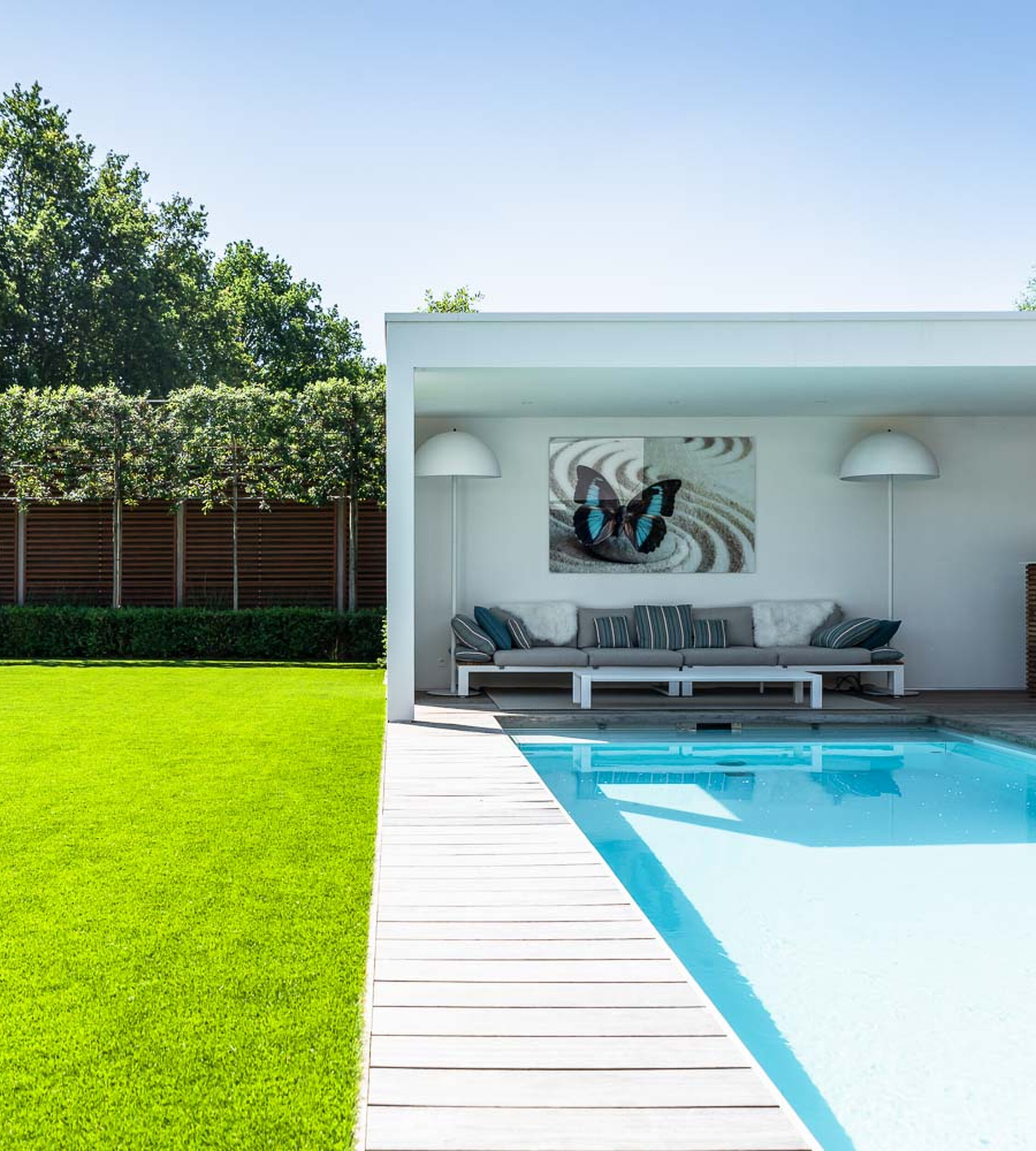 Artificial grass around your pool