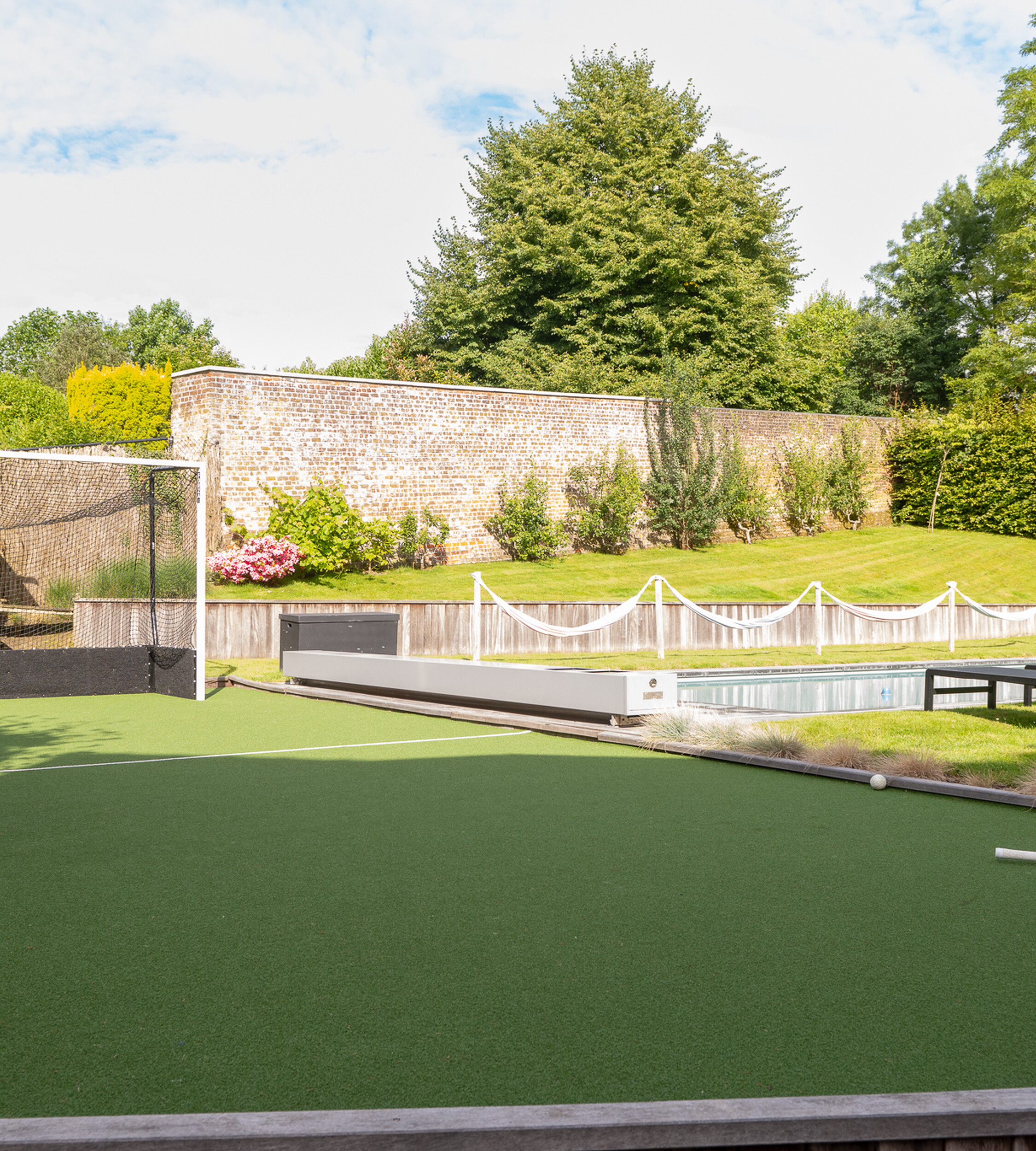Artificial grass for a home hockey field