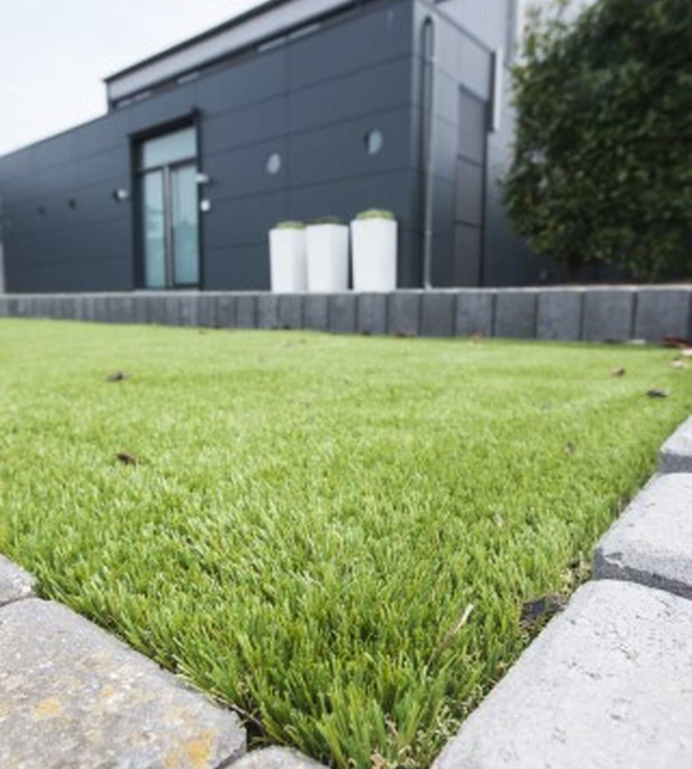 Durable artificial grass for a modern garden, sleek and easy to maintain