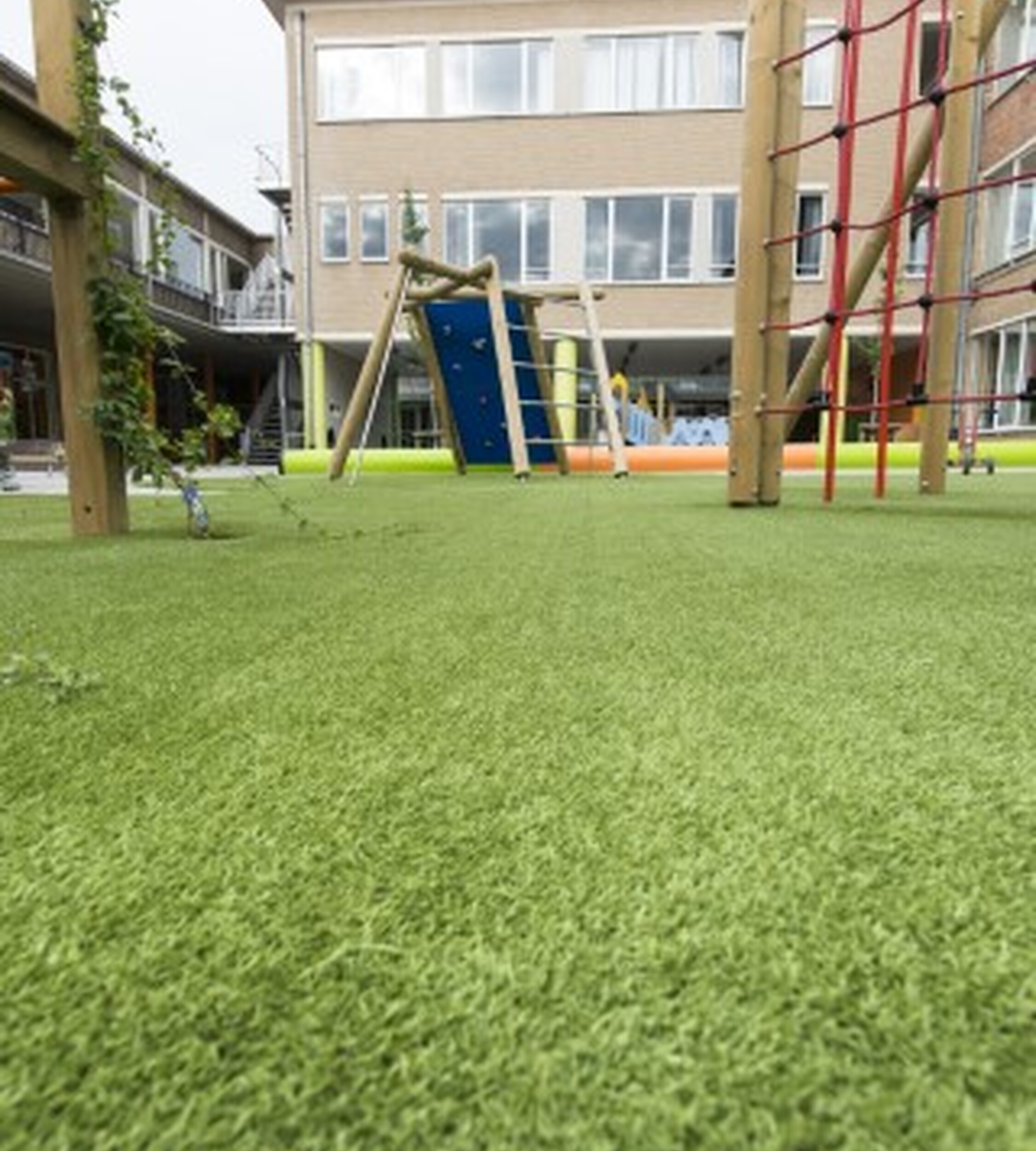Durable artificial grass for playgrounds - safe, sustainable and easy to maintain