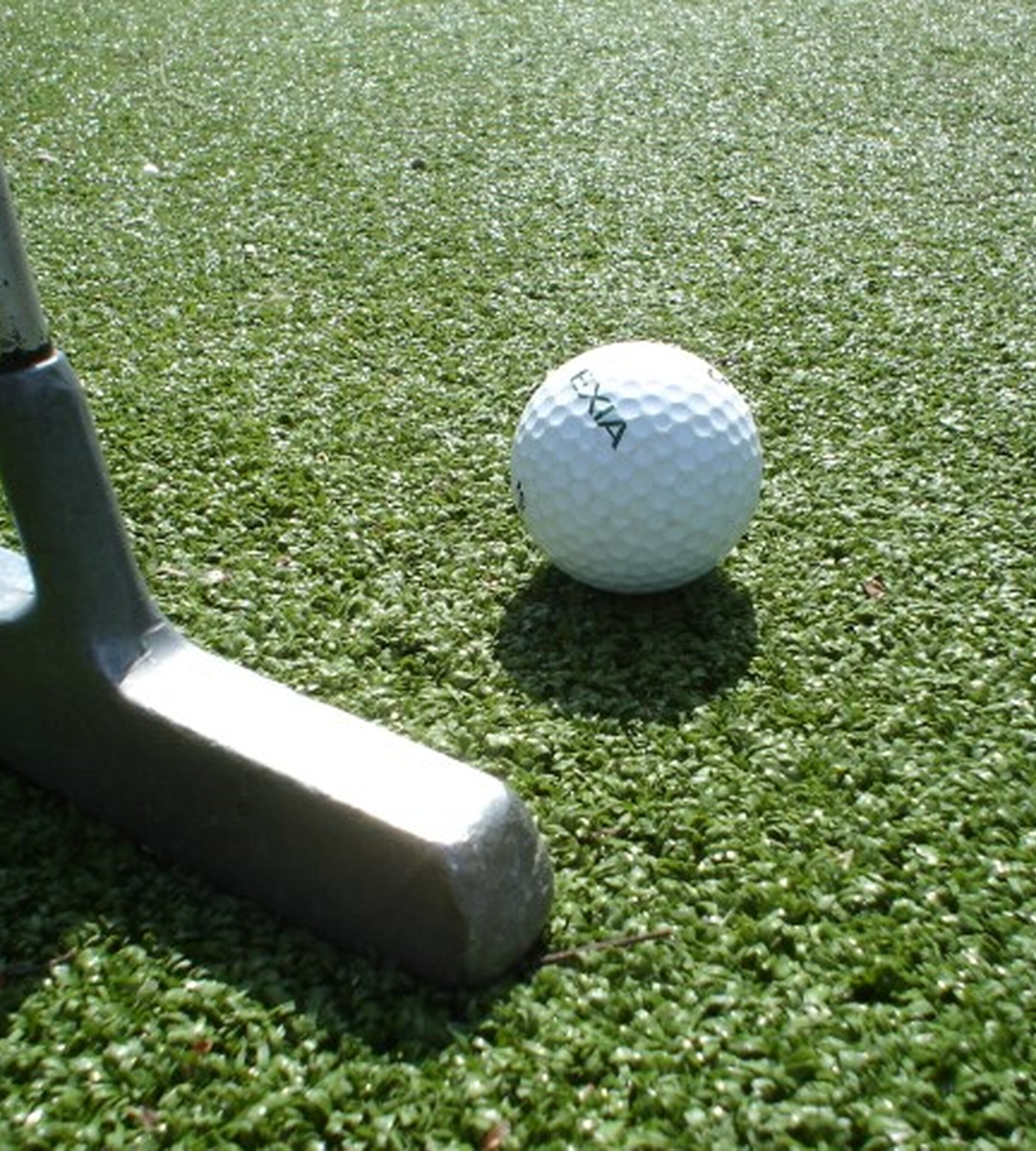 Artificial grass for golf greens and practice areas